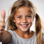 The girl showing thumbsup