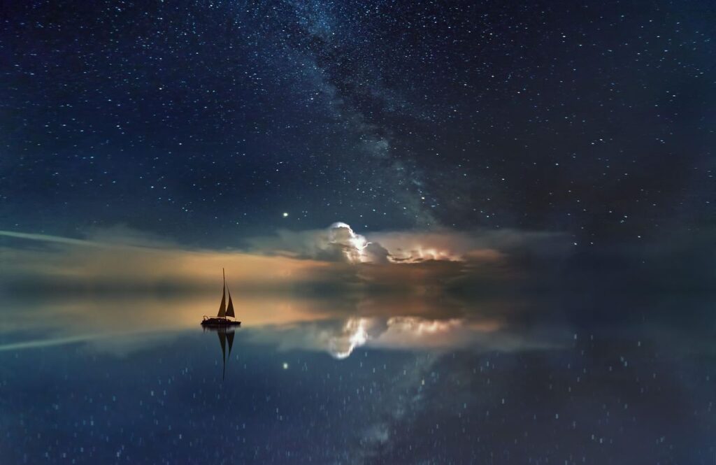 The sky with stars that reflect on water