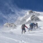 The climbers on ice capped mountain