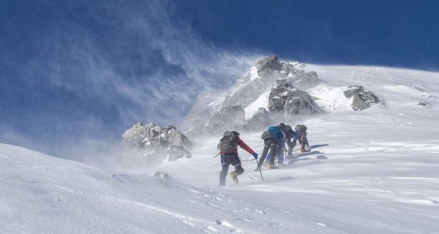 The climbers on ice capped mountain
