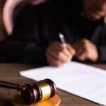 The judge writing judgement