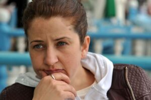 Thinking woman A woman sitting with deep thinking